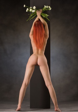 Ariel Naked Holding a Flower
