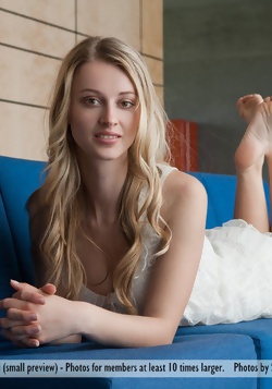 Blonde Beauty Carisha Nude on a Sofa